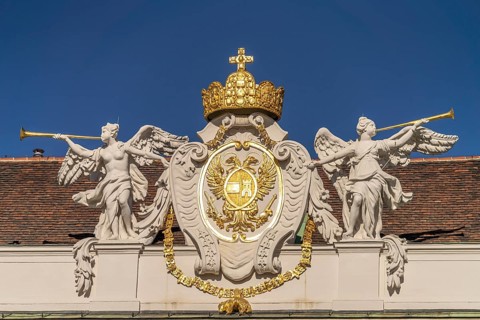 Coat of arms on the Imperial Chancellery Wing of the Hofburg Imperial Palace in Vienna, Austria