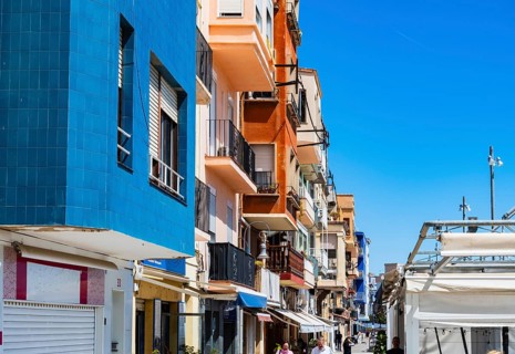Colourful fishermen's houses and restaurants in El Serallo, an old harbour district in Tarragona,