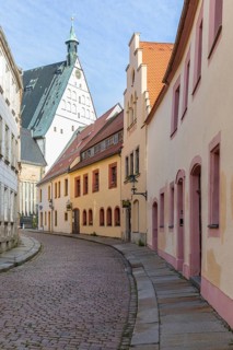 Historic Kreuzgasse with a view of the cathedral, Freiberg, Saxony, Germany