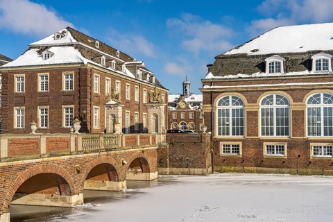 The snow-covered Nordkirchen Castle in winter, Nordkirchen, Münsterland, North Rhine-Westphalia,