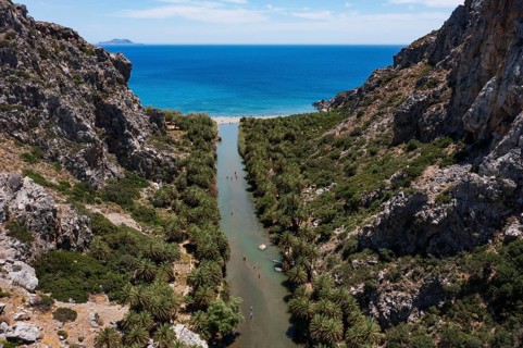 Drone shot, Preveli Beach, Kourtaliatiko Gorge with palm grove, south coast, Crete, Greece