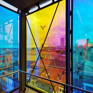 Marollescenece, art installation The Cube, coating of the windows with translucent dichroic films,