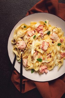 Tagliatelle pasta, in cream sauce with salmon, homemade, no people