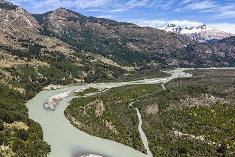 River rio delta o el leon, mountain range of Valle Exploradores in the back, aerial view,