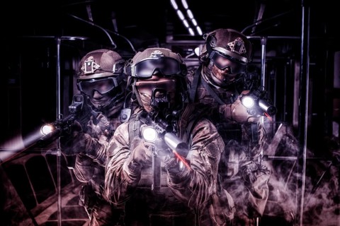 Soldiers of a special anti-terrorist unit storm a railway carriage in the subway. Special operation