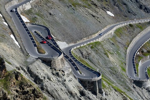 View from an elevated position from a bird's eye view like an aerial view of three hairpin bends in