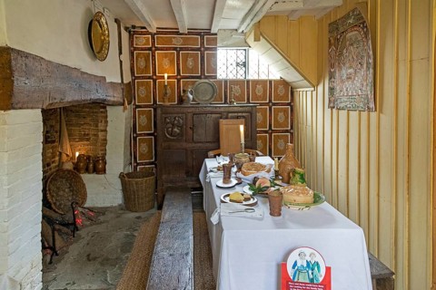 Interior view, laid table, fireplace, birthplace of William Shakespeare, Stratford-upon-Avon,