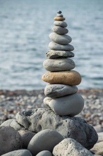 Concept of balance and harmony, pile of stones, beach, sea, Iceland