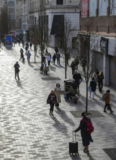 Shoppers walking on pedestrianised Eliot Street in city centre, Liverpool, England, UK