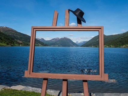 Art object picture frame, rest area at Vassenden, view over lake Joelstravatn, Norway