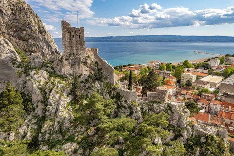 The old town centre of Omis with the ruins of the Mirabella or Peovica fortress seen from above,