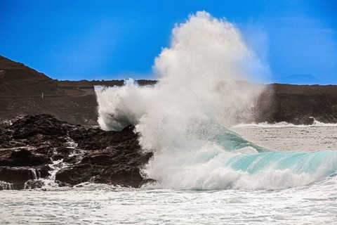Sea shore with moving waves, Lanzarote, Canary Islands, Spain