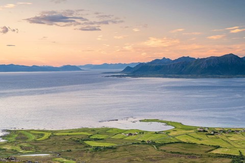 View of the coast and mountains from Mount Hoven, Gimsoy, Lofoten, Norway