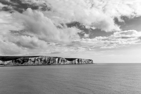 Chalk coast on the horizon, white cliffs by the sea, monochrome, Dover, Kent, England, Great