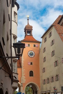 Regensburg, Germany. October 7th 2024 Regensburg Clock Tower at the entrance of the Stone Bridge,
