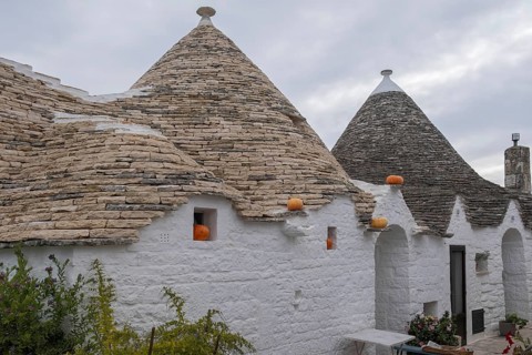Trulli house decorated with pumpkins, Alberobello, UNESCO World Heritage Site, Apulia, Italy