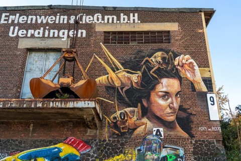 Mural by Mexican paintress and 3D artist Adry del Rocio, on an old harbour building, part of the