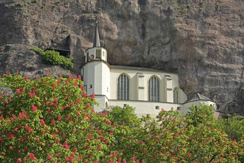 Rock church built in 1484 and landmark, rock, cliff, stone wall, blossoms, Idar-Oberstein,