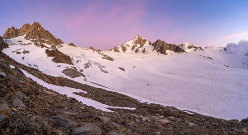 High alpine mountain landscape at sunset, Glacier du Tour, glacier and mountain peak, summit of the