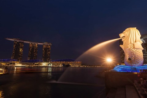 SINGAPORE, JANUARY 1, 2014: Night view of Singapore Merlion at Marina Bay and Marina Bay Sand