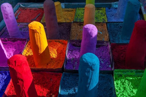 Piled up, coloured Kum-Kum powder, market, Pushkar at the holy Pushkar Lake, Rajasthan, India