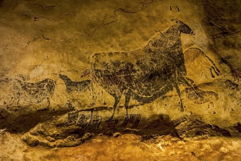 Replica of part of the Lascaux cave showing prehistoric animals like aurochs and wild horses at the
