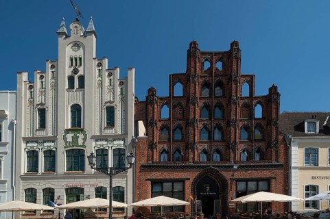 Historic buildings on the market square, Art Nouveau house on the left, Old Swede on the right,