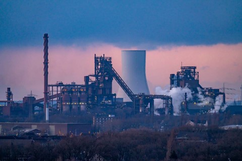 Skyline of the steel location Duisburg, Thyssenkrupp Steel Europe, in Duisburg-Bruckhausen, sunset,