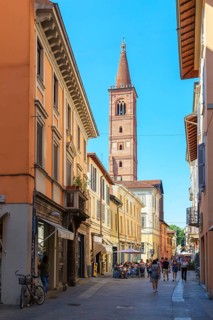 Old town street leading to Santa Maria del Carmine church, Pavia, Lombardy, Italy