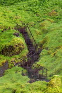 Stairway to Waterfall Seljalandsfoss, 60 m high, located in southern iceland