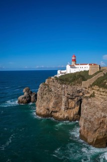 Sagres, Algarve, Portugal - Lighthouse at the Cap de Sao Vicente. Historical sight. Rocky headland