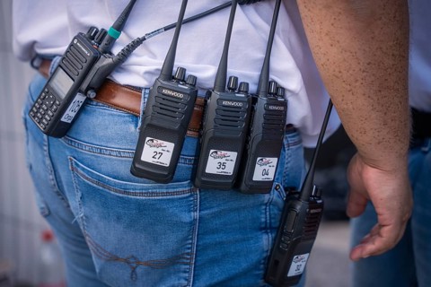 Security communication represented by several radios on the belt, Malleparty Böblingen, Germany
