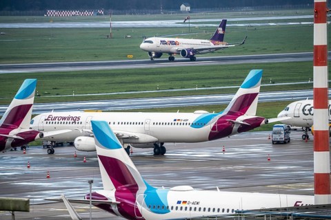 Düsseldorf Airport, Eurowings aircraft on the apron, Air Cairo aircraft landing, Düsseldorf, North