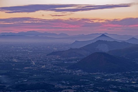 View of the densely populated Neapolitan region and the mountains near Caserta at dusk. San Felice