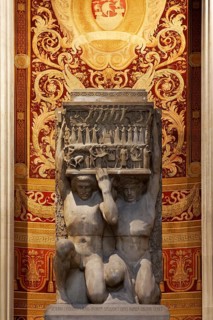 Two kneeling atlas figures, giants, in the Pantheon, monument to the forgotten artists, National