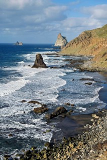 Beach of Playa de Benijo at high tide with the rock Roques de Anaga, Tenerife, Canary Island, Spain