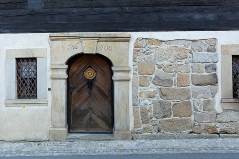 Historic door frame on a half-timbered house, Hauptstraße 80 in Waltersdorf, Großschönau, Saxony,