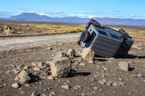 Crashed car, lying on its side, road 864 connecting ring road no.1 with eastern side of Dettifoss