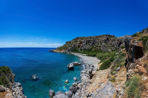 Excursion boat at Preveli Beach at the end of the Kourtaliatiko Gorge, south coast, Crete, Greece