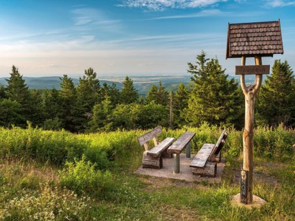 View from Schneekopf in the Thuringian Forest, Geratalblick signpost and table with benches for