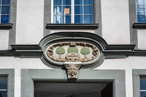 Decorated cartouche, stone carving on a historic town house in the old town of Lindau, Bavaria,