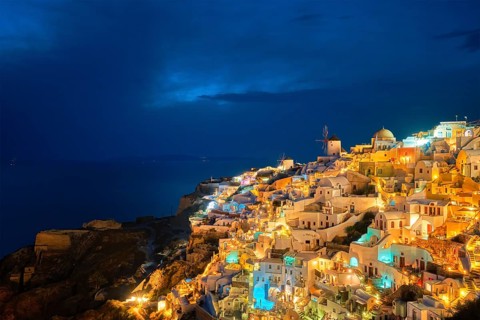 Famous greek iconic picturesque tourist destination Oia village with traditional white houses and