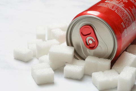 Cola can and lots of sugar cubes