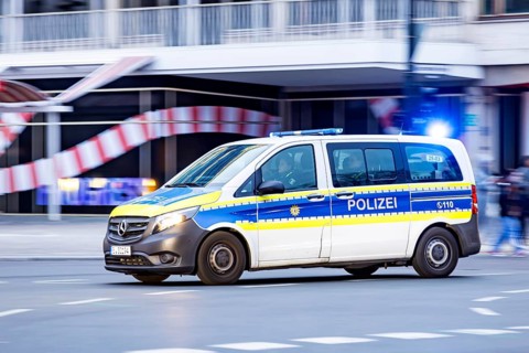 City view of Berlin. Police mission with flashing lights. Berlin, Germany