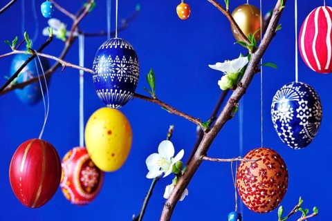 Easter, Easter bouquet with colorful Easter eggs, branches with flowers of an ornamental quince,