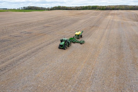 Grass Lake, Michigan - A farmer applies liquid fertilizer to a farm field in early spring. The war
