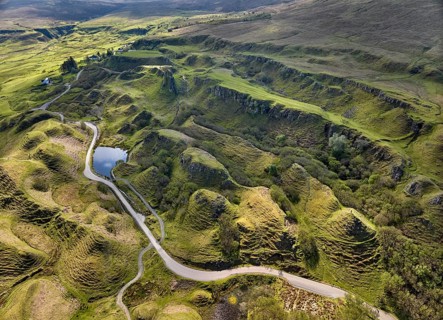 Aerial drone photo of the volcanic landscape of Glen Fairy, Isle of Skye, Scotland, UK