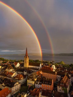 Aerial view of the historic old town of Radolfzell am Lake Constance with the cathedral illuminated