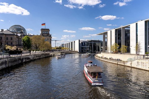 Excursion boat trip on the Spree in Berlin's government district along the Reichstag and the rear