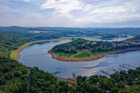 The Eder river loop around the village of Scheid, Rehbach in the foreground, in the